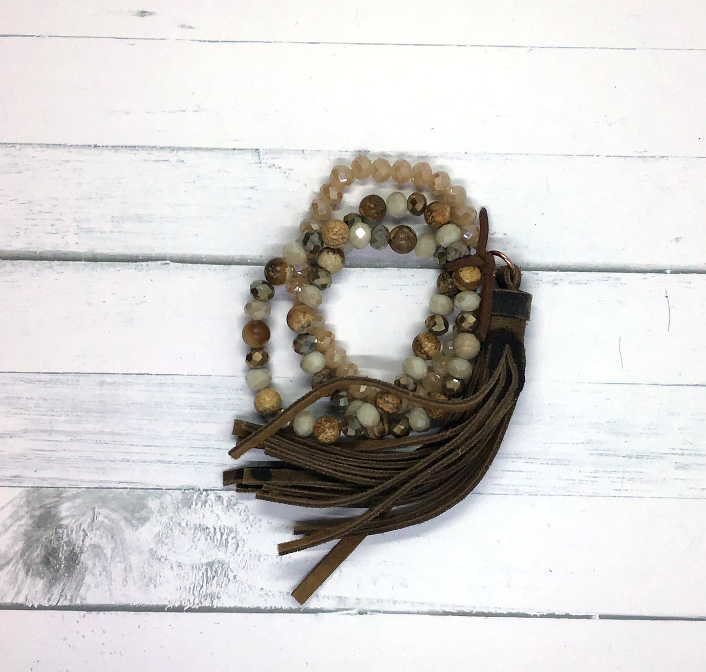 TRIPLE STRAND BEADS WITH TASSEL