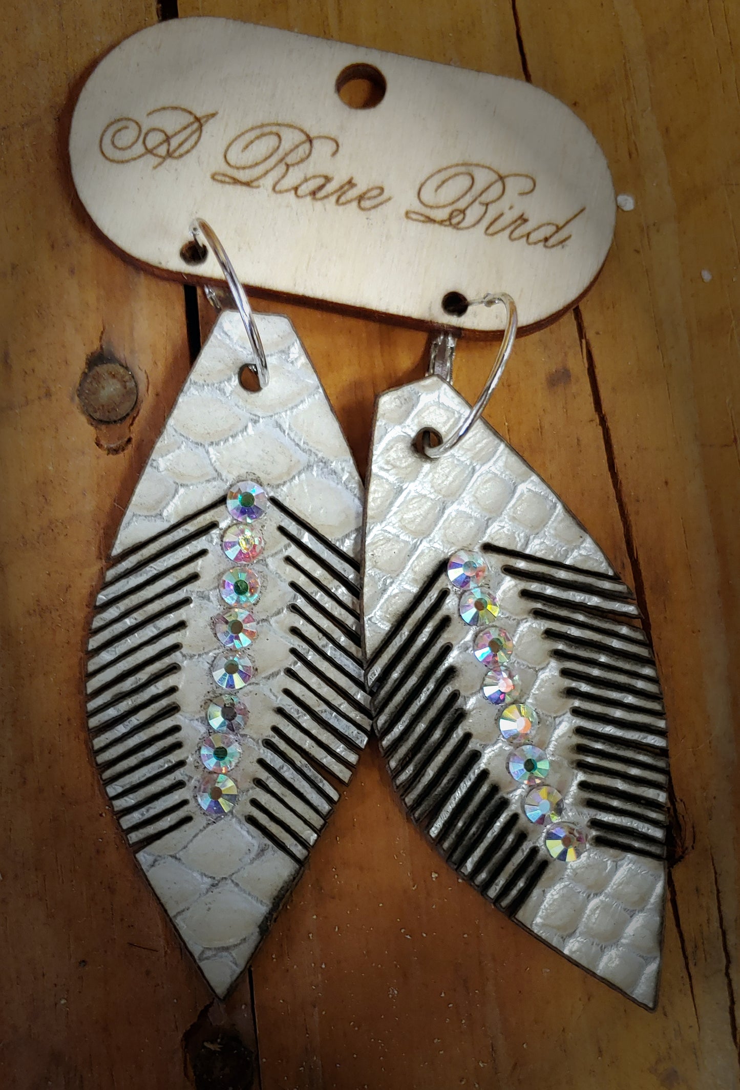 WHITE LEATHER FEATHER EARRINGS